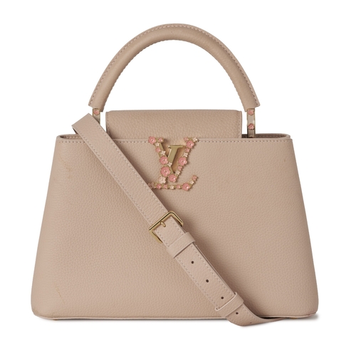 449 - Louis Vuitton, a rare Bloom Capucines PM handbag, from the S/S 2024 collection, crafted from powder ... 