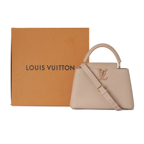 449 - Louis Vuitton, a rare Bloom Capucines PM handbag, from the S/S 2024 collection, crafted from powder ... 