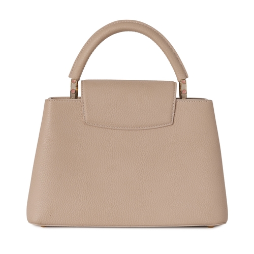 449 - Louis Vuitton, a rare Bloom Capucines PM handbag, from the S/S 2024 collection, crafted from powder ... 