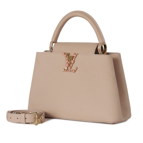 449 - Louis Vuitton, a rare Bloom Capucines PM handbag, from the S/S 2024 collection, crafted from powder ... 