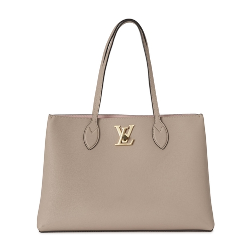 450 - Louis Vuitton, a Lockme shopper tote, featuring a grey grained calfskin leather exterior with gold-t... 