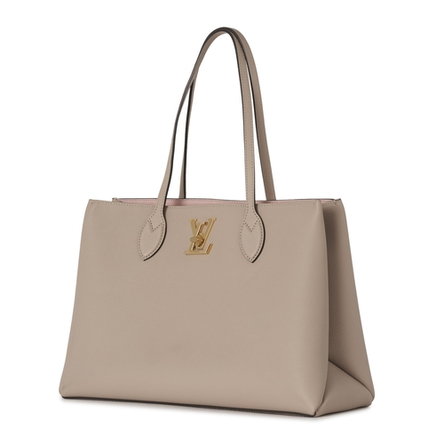450 - Louis Vuitton, a Lockme shopper tote, featuring a grey grained calfskin leather exterior with gold-t... 