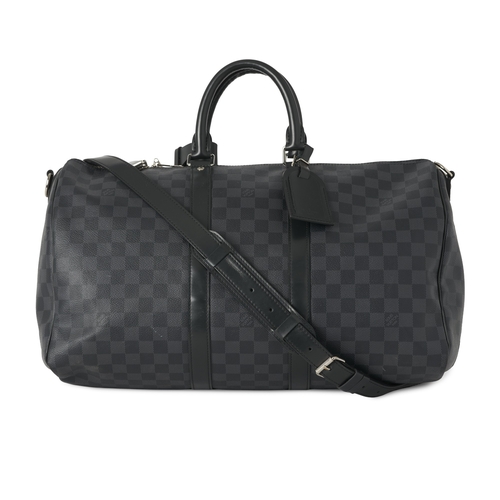 453 - Louis Vuitton, a damier graphite Keepall 45 luggage bag, featuring black leather trim, rolled leathe... 