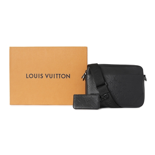 461 - Louis Vuitton, a monogram shadow Duo messenger bag, crafted from black monogram embossed calf leathe... 