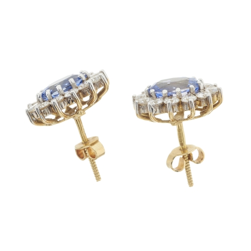 47 - A pair of 18ct gold sapphire and brilliant-cut diamond cluster stud earrings, estimated total diamon... 