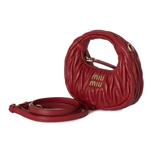474 - Miu Miu, a micro matelasse Wander hobo handbag, crafted from red quilted nappa leather, with gold-to... 