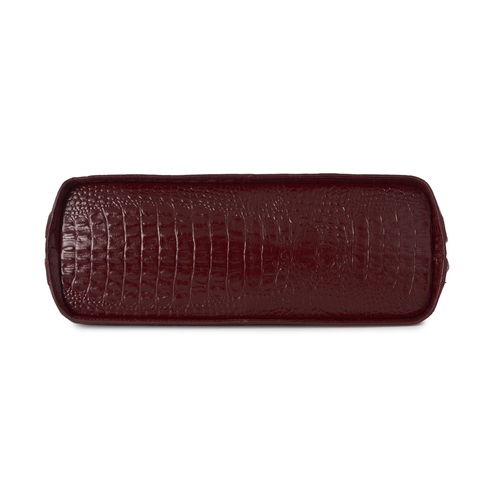 484 - Osprey, an embossed leather handbag w/ keyring, featuring a burgundy crocodile embossed leather exte... 