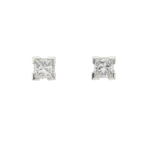 49 - A pair of 18ct gold square-shape diamond single-stone stud earrings, estimated total diamond weight ... 