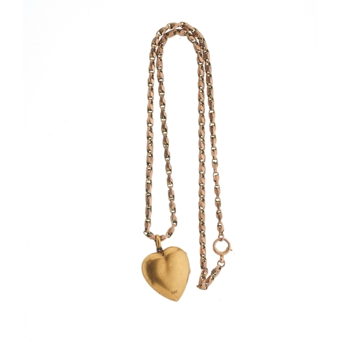 5 - A late Victorian 15ct gold ruby and rose-cut diamond heart-shape locket pendant, suspended from a ye... 