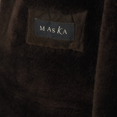 510 - Maska, a ladies brown shearling coat, short lapel collar, button fastenings and two outer pockets, l... 