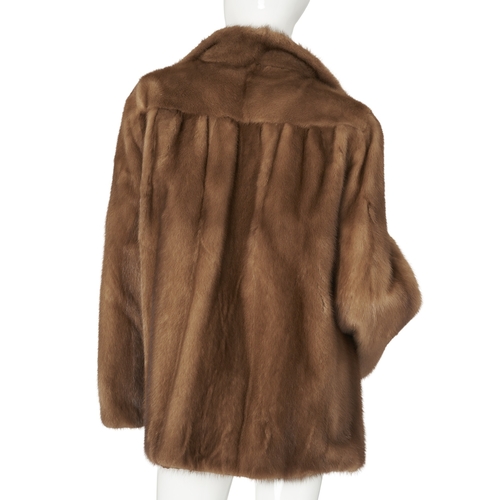 521 - A pastel mink fur jacket, with a lapel collar, hook and eye clip fastenings and two outer pockets, c... 