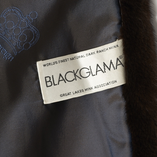 522 - Blackglama, a dark ranch mink jacket, featuring a lapel collar, hook and eye clip fastenings, fitted... 