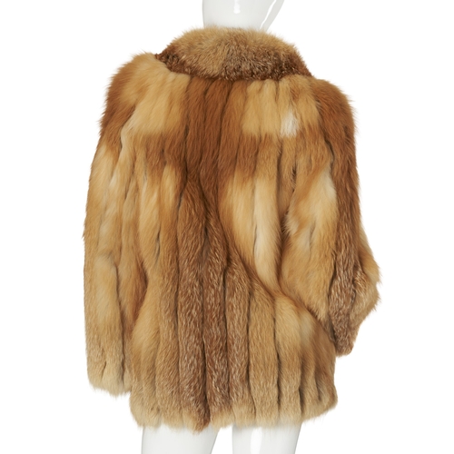 538 - A red fox fur jacket, with a notched lapel collar, hook and eye clip fastenings and two outer pocket... 