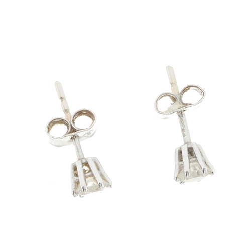 54 - A pair of 18ct gold brilliant-cut diamond single-stone stud earrings, estimated total diamond weight... 