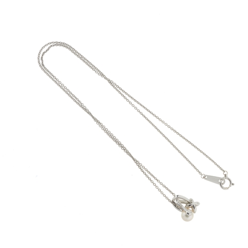 57 - Mikimoto, an 18ct white gold cultured pearl and brilliant-cut diamond flower necklace, with 18ct gol... 