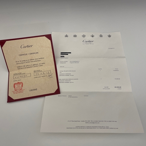 62 - Cartier, a pair of 18ct white gold pave-set diamond, Panthere de Cartier earrings, with emerald eyes... 