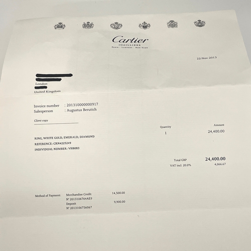 63 - Cartier, an 18ct white gold pave-set diamond Panthere de Cartier ring, medium model, with emerald ey... 