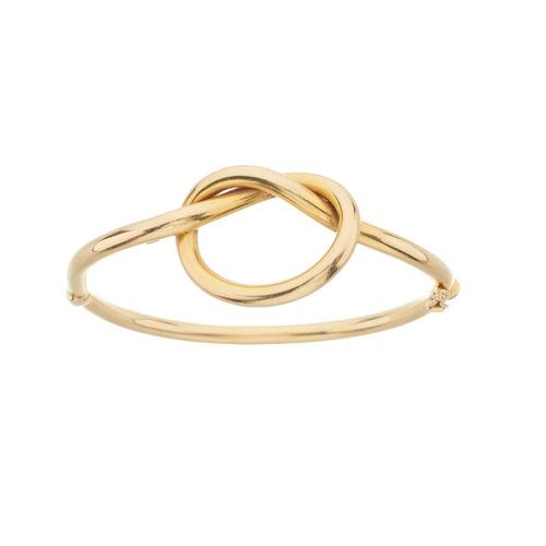 67 - Ilias Lalaounis (attributed), an 18ct gold love knot hinged bangle bracelet, stamped 750, Greece, in... 
