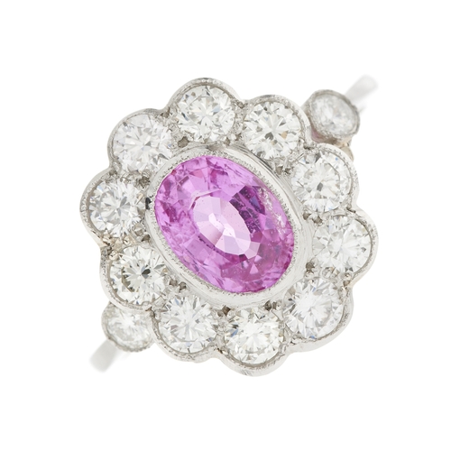76 - A platinum pink sapphire and brilliant-cut diamond cluster ring, sapphire estimated weight 0.90ct, e... 