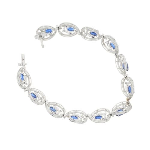78 - An 18ct gold sapphire and brilliant-cut diamond openwork bracelet, estimated total sapphire weight 8... 