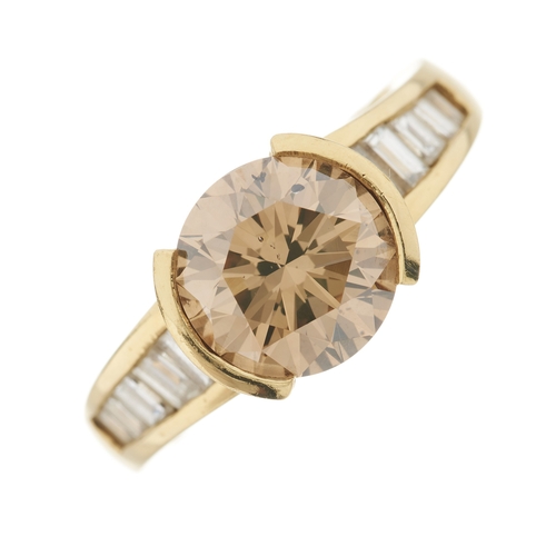 95 - An 18ct gold brilliant-cut coloured diamond single-stone dress ring, with calibre-cut colourless dia... 