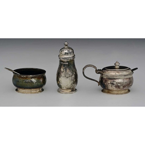 108 - A twentieth-century silver three-piece associated condiment set, Birmingham hallmarks, comprising mu... 