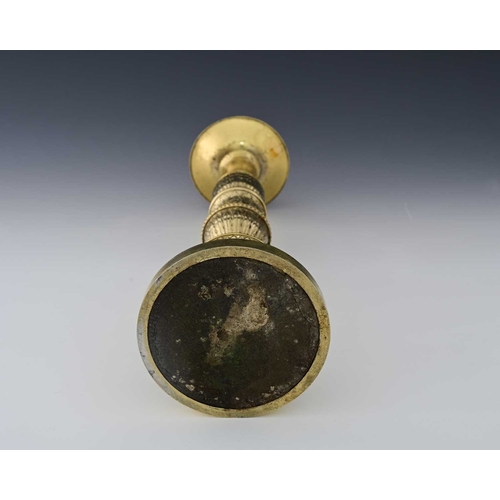 113 - Guild of Handicraft (George Henry Hart), an Edward VII silver-gilt Arts & Crafts style candlestick, ... 