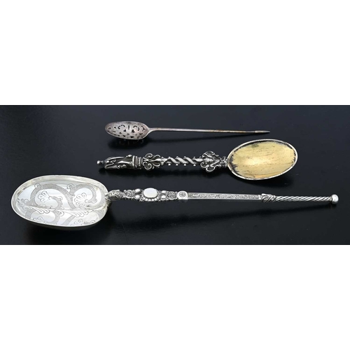160 - An eighteenth-century silver mote spoon, maker's mark only, by 'W.T', length 15.5cm, together with a... 