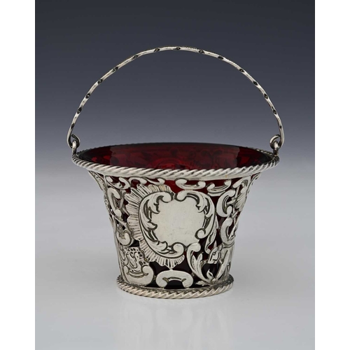 94 - A Victorian silver swing handle sugar basket or cream pail, by Holland, Aldwinckle & Slater, London ... 
