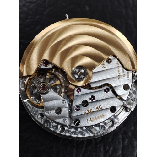 216 - 
Patek Philippe 
A Nautilus bracelet watch. Circa 1984
Case: Signed. 18ct gold. Bezel set with diamo... 