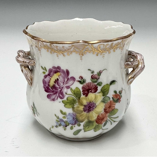 109 - A collection of continental ceramics, to include a Dresden tea cup and saucer painted with floral ga... 