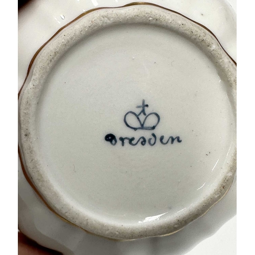 109 - A collection of continental ceramics, to include a Dresden tea cup and saucer painted with floral ga... 