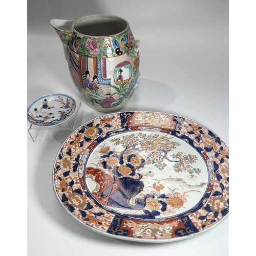 114 - A Chinese export porcelain famille rose jug, bulbous form, decorated with scenes of family or court ... 