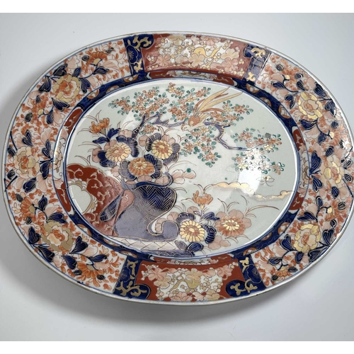 114 - A Chinese export porcelain famille rose jug, bulbous form, decorated with scenes of family or court ... 