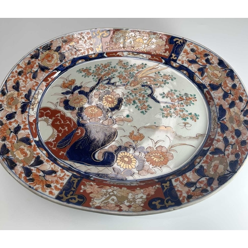 114 - A Chinese export porcelain famille rose jug, bulbous form, decorated with scenes of family or court ... 