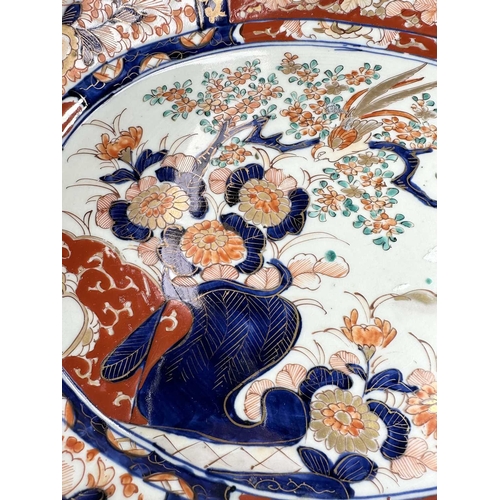 114 - A Chinese export porcelain famille rose jug, bulbous form, decorated with scenes of family or court ... 