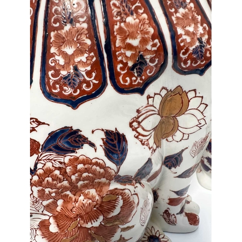 115 - A pair of decorative Imari-patterned chimney dogs, 35cm high (2)