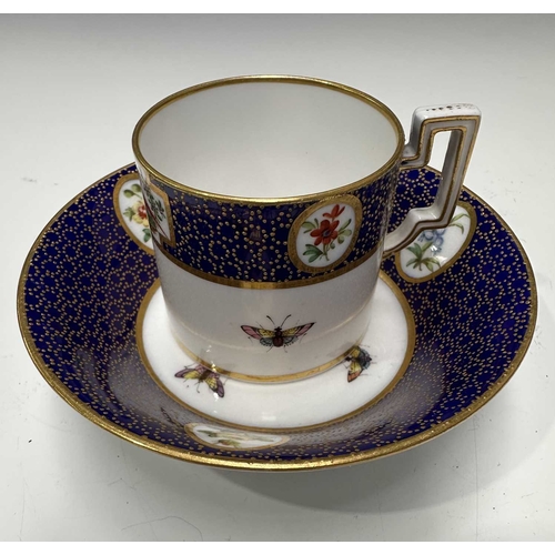 116 - A collection of British porcelain to include: a small Copeland hand-painted coffee can and saucer de... 