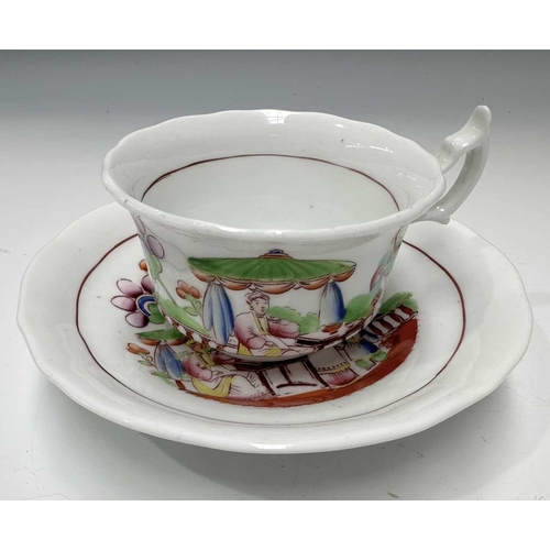 116 - A collection of British porcelain to include: a small Copeland hand-painted coffee can and saucer de... 