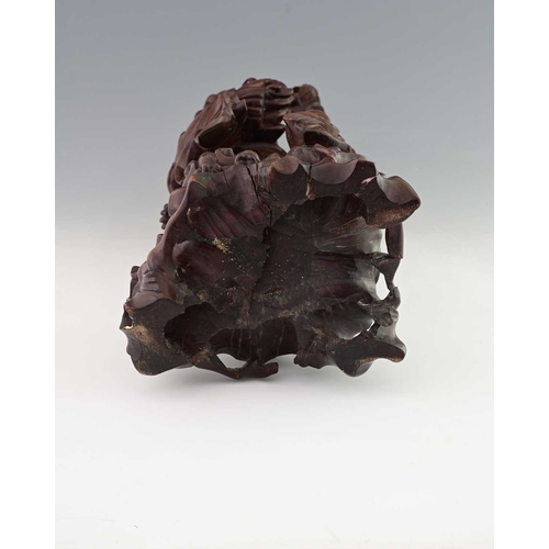 118 - A large Chinese carved hardwood figure of Shouxing, modelled in high relief holding a peach and staf... 