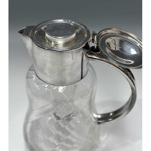 120 - A lemonade/water with silver plated mount by Mappin & Webb, wrythen glass body and plated ice holder... 