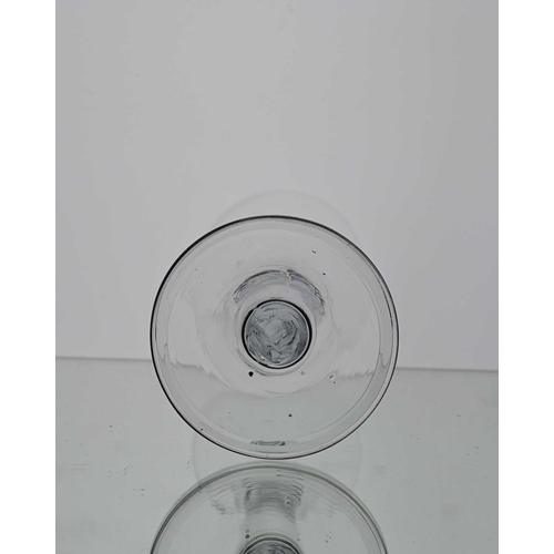 122 - A plain stemmed wine glass, circa 1750, the bell shaped bowl on a plain cylindrical stem and folded ... 