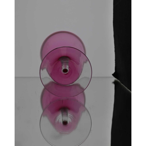 123 - Harry Powell for James Powell and Sons, Whitefriars, an Arts and Crafts ruby red bowled wine glass, ... 