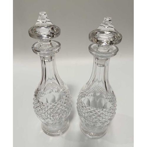 124 - A pair of Waterford crystal Colleen pattern wine decanters and stoppers, 34cm high (2)