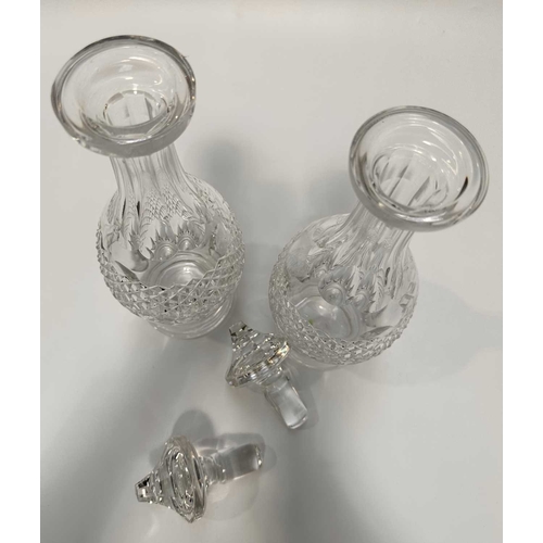 124 - A pair of Waterford crystal Colleen pattern wine decanters and stoppers, 34cm high (2)