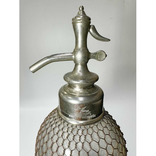 126 - An early 20th century glass and wire mesh double-gourd soda syphon, chrome tap, French, marked Vérit... 