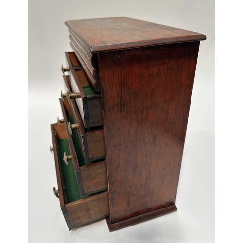 131 - A stained pitch pine, scratch built, apprentice piece chest of drawers, two over three, with secret ... 