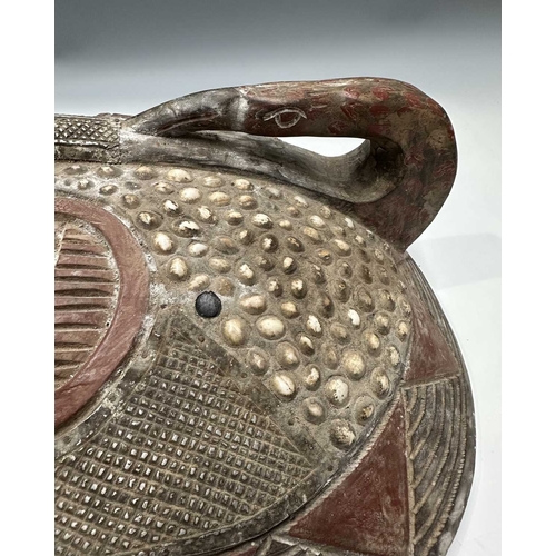 133 - An African tribal mask, probably from the Ashanti (Asante) people of Ghana, a large round face carve... 