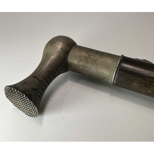 134 - A late 19th early 20th century ladies parasol, carved horn handle and tip, cane shaft with white met... 