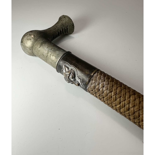 134 - A late 19th early 20th century ladies parasol, carved horn handle and tip, cane shaft with white met... 